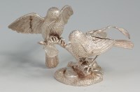 Lot 649 - A contemporary sculpted silver table ornament,...