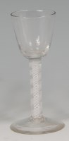 Lot 517 - A mid-18th century wine glass, having a round...