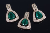 Lot 676 - A contemporary 14ct gold emerald and diamond...