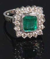 Lot 682 - A contemporary 18ct white gold emerald and...