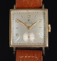 Lot 687 - A Rolex gents 9ct gold cased tank watch, the...