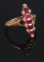 Lot 693 - An early 20th century yellow gold ruby and...