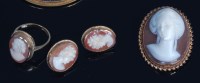 Lot 701 - A carved shell cameo brooch, depicting a head...