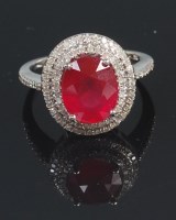 Lot 703 - A contemporary 14ct white gold ruby and...