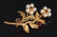 Lot 708 - A 9ct gold seed pearl and garnet set leaf and...