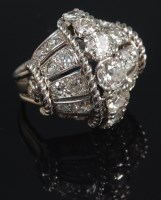 Lot 711 - An Art Deco white metal diamond set ladies...