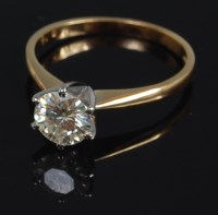 Lot 712 - An 18ct gold diamond solitaire ring, the six...