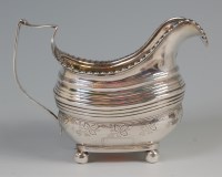 Lot 561 - A George III silver cream jug, of squat...
