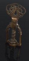 Lot 754 - A Georgian brass open cage 'thumbscrew'...