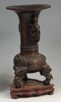 Lot 782 - A 19th century Chinese bronze vase on hardwood...