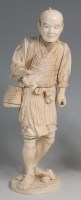 Lot 784 - A Japanese Meiji period carved ivory sectional...