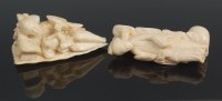 Lot 786 - A Japanese Meiji period carved ivory walking...