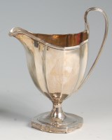 Lot 613 - A George III silver pedestal cream jug, of...