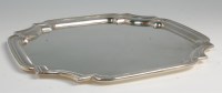 Lot 629 - A silver salver, of shaped circular form,...