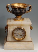 Lot 907 - A late Victorian onyx mantel clock, the whole...