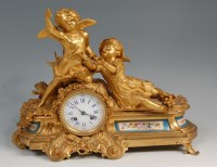 Lot 910 - A mid-19th century French ormolu and porcelain...