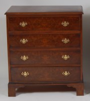 Lot 945 - An 18th century style burr walnut chest,...