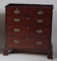 Lot 946 - A George III mahogany squarefront chest of two...