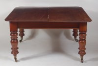 Lot 957 - A Victorian mahogany extending dining table,...