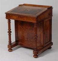 Lot 968 - An early Victorian figured walnut slopefront...