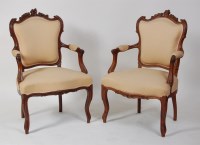 Lot 976 - A pair of French beechwood and upholstered...