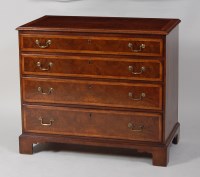 Lot 978 - A figured walnut and feather banded...