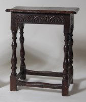 Lot 982 - An 18th century oak joint stool, the top...