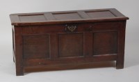 Lot 1004 - A late 17th century joined oak three panel...