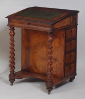 Lot 1010 - A Victorian figured walnut kneehole writing...