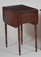 Lot 1019 - A George IV mahogany work table, having fall...