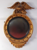 Lot 1026 - A Victorian giltwood and gesso convex wall...