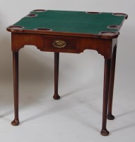 Lot 1030 - An early George III mahogany card table, the...