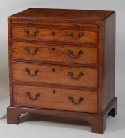 Lot 1033 - A George III mahogany chest, having a caddy...