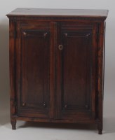 Lot 1035 - An antique joined oak fitted cupboard, having...