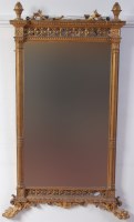 Lot 1042 - A Regency giltwood and gesso pier glass, the...