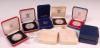 Lot 216 - 9 various silver coins to include; Guernsey...