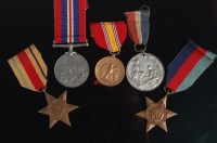 Lot 268 - A group of medals to include Great War Peace,...