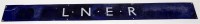 Lot 47 - An LNER white on blue ground railway board...
