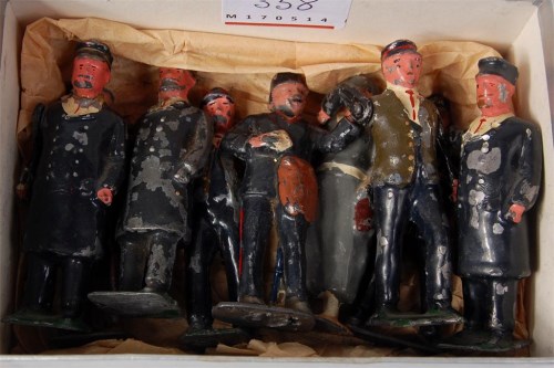 Lot 358 - 9 gauge 1 cast figures, 3 station staff with...