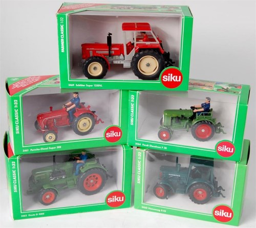 Lot 1225 - Siku, 1/32 scale mixed tractor group to...