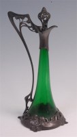 Lot 1 - A WMF Art Nouveau pewter and green glass...