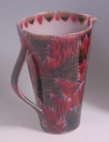 Lot 9 - A 1970s studio pottery single handled jug,...