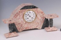 Lot 13 - An Art Deco variegated marble three piece...