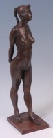 Lot 31 - A bronzed composition figure of a full-length...