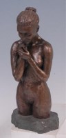 Lot 32 - A contemporary bronzed composition female...