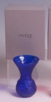 Lot 47 - A modern boxed Lalique blue glass vase, of...