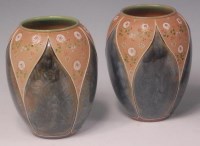 Lot 71 - A pair of Royal Doulton stoneware vases, of...