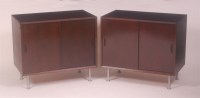 Lot 266 - A pair of 1960s Danish mahogany side cupboards...