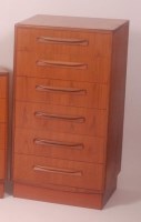 Lot 270 - A 1970s G-Plan teak chest, having six drawers...