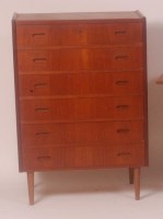 Lot 279 - A 1960s Danish teak chest, of six long drawers,...